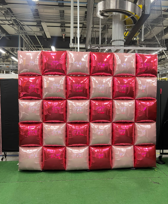 Inter Miami New Store Opening Balloon Decor. 1) Custom Square Wall 7.5 x 9 ft with logo. Colors: Black, pink.