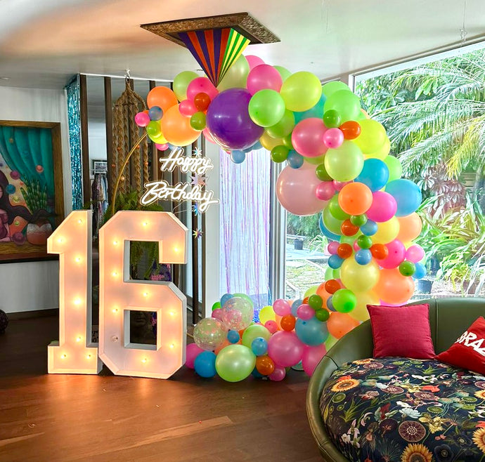 Fun backdrop w/ marquee numbers