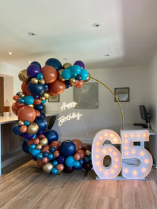 Fun backdrop w/ marquee numbers